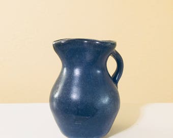 Small blue pitcher