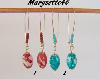 Earrings with oval beads in shades