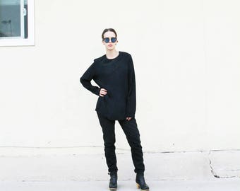 Long sleeved black silk blouse. M