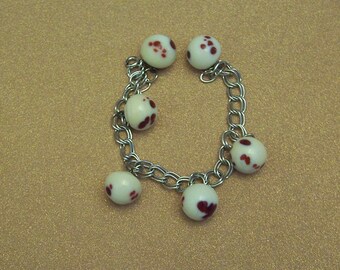Sterling silver charm bracelet vintage white glass oxblood buttons