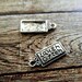 Word Charms Quote Charms Tag Charms LAUGH OFTEN Charms Inspirational Charms Antiqued Silver Charms Jewelry Tags 4 pieces