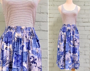 1980s blue novelty print skirt / 80s floral midi skirt / 1980s circle skirt / 80s swing skirt