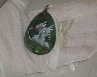 Pendentif argent, avec au centre une peinture émaillée d'un Pharaon
