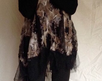 Sleeveless nuno felted tunic with tulle at the hem.