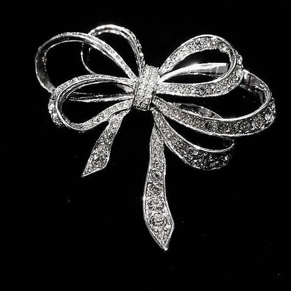 Kenneth Lane Rhinestone Ribbon Brooch / KJL for AVON