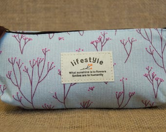 Cute blue makeup bag with flowers