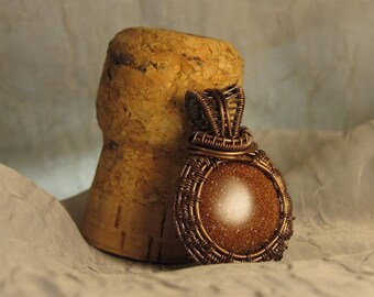 SUNDAY MORNING ( Goldstone wrapped with oxidized copper)