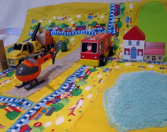 Great play mat with circuit and landscape into bag to carry my cars