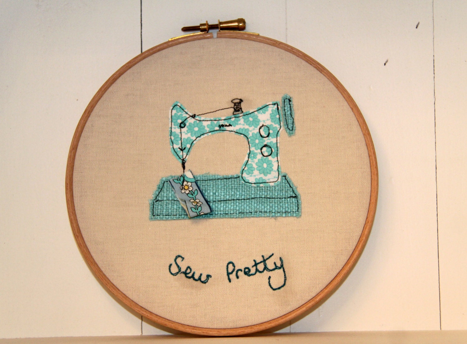 Embroidery hoop textile artwork