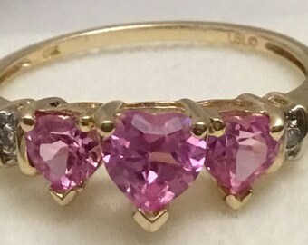 Vintage three heart pink sapphire ring.