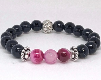 Pink agate beads and black agate bracelets