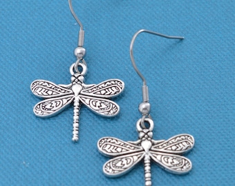 Dragonfly earrings in silver toned metal. Dragonfly earrings. Dragonfly charms. Dragonfly gifts. Dragonfly jewelry.