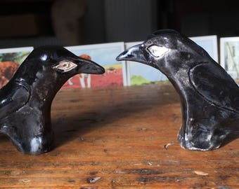 Pair of handmade ceramic crows
