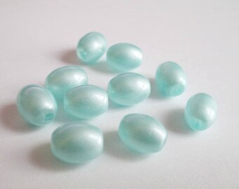 10 blue glass oval beads shiny 11x8mm