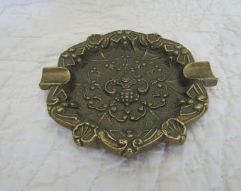 Vintage brass ashtray, sexy girls showing there pussy