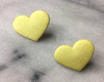 Yellow sparkly heart earrings