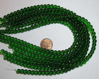 One Strand of 6mm Round Glass Beads- Emerald Green- about 50 beads on a strand