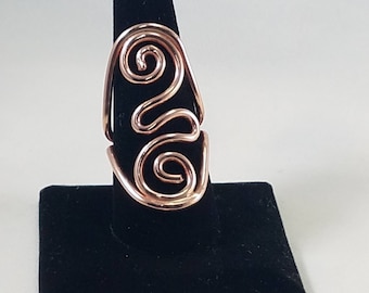 Copper swirl saddle ring