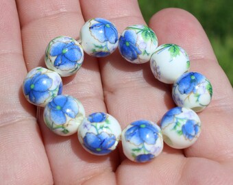 2 ceramic multicolored beads blue Orchid flowers 10 MM.