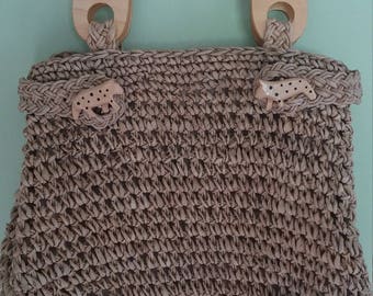 Vintage tan wicker straw handbag purse with wooden pigs and handle