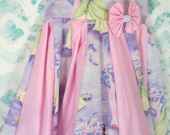 custom boutique twirl dress made with disney Tiana fabric 2-6