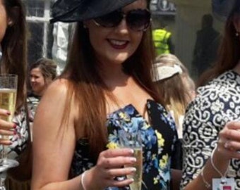 Black Feather Fascinator..Stunning shaped Fascinator on a Headband..