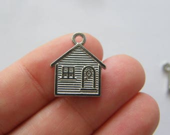 4 House charms silver tone P441