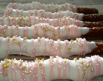 12 pink and gold chocolate covered caramel pretzels
