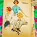 McCall's Sewing Pattern - 1959 - Woman's tuck-in front buttoned blouse - size 12 bust 32" - mpn 5079 - used and complete