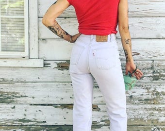 Vintage 80s,90s Levi's 501 jeans,high waist,mom jeans,rare,tight,fitted,light wash,light blue,denim,American,button fly,long,small,26 waist