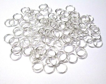 50 7mm silver jump rings