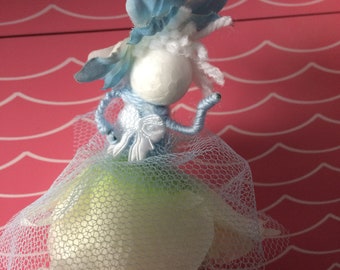 Blue and white ribbon flower fairy