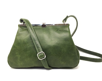 green leather bag with metal closure