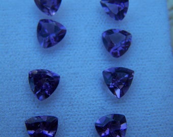 Eight 6MM Triangle Cut Amethyst