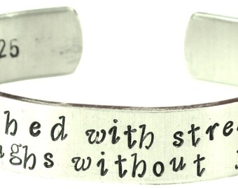 She is clothed with strength and dignity, and she laughs without fear of the future - Hand stamped bracelet- Proverbs 31:25