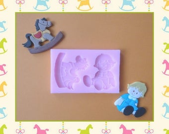 Silicone mold: rocking horse and girl.