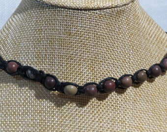 Black knotted hemp with purple creek stone and map stone gemstone beads. Adjustable length necklace. NECK-512
