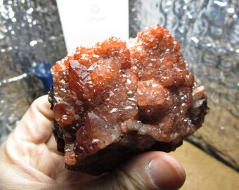 Red hematite included quartz cluster from Tinjded, Morocco