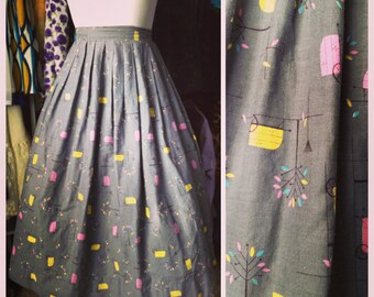 Vintage 50s skirt / 1950s skirt / novelty print skirt / full skirt / cotton skirt / cart campers trees / pleated skirt / waist 24" / 6010