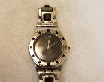 Swatch Nuit Sauvage YLS155G Swiss Black Dial Black Stones Two Tone womens new battery