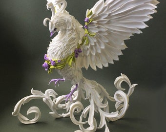 Figurine of the firebird with flowers