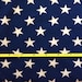 White stars on blue cotton lycra knit fabric 58" wide