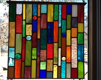 Stained glass panel, 11x11 inches, with copper frame
