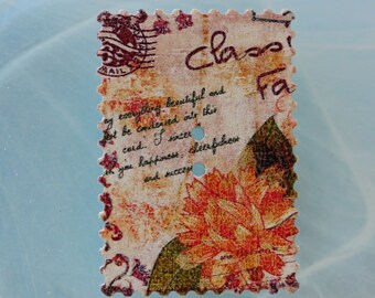 button rectangle wood flowers and writing