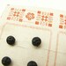 24 jet buttons, tiny buttons made of genuine jet, 5 mm across and still carded!!