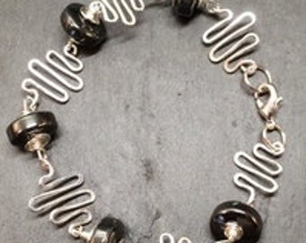Silver and hematite bracelet