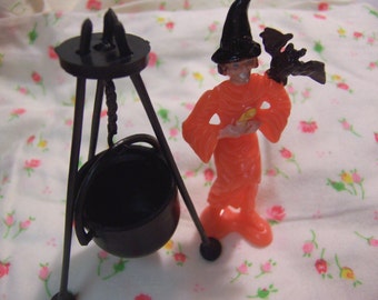 halloween witch and her cauldron