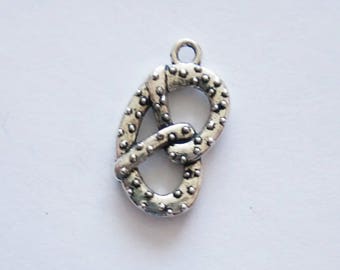 5 Pretzel Charms. Tibetan Silver.