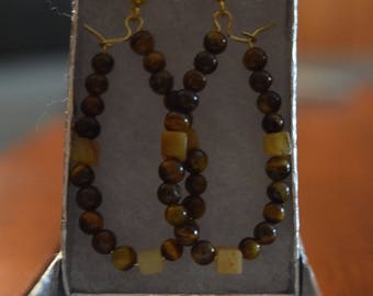 Hoop earrings with brown and orange beads