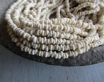 Mini tiny beige rondelle lampwork glass beads, delicate, opaque cream semi matte, Indonesian 1 to 1.5 x 3mm ( 22 inches strand ) 7bb13-4